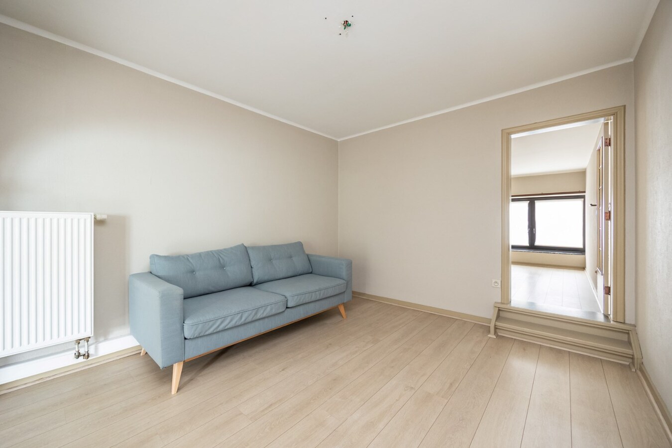 Interessante investeringsopportuniteit in hartje Malle: handelspand + 2 appartementen 