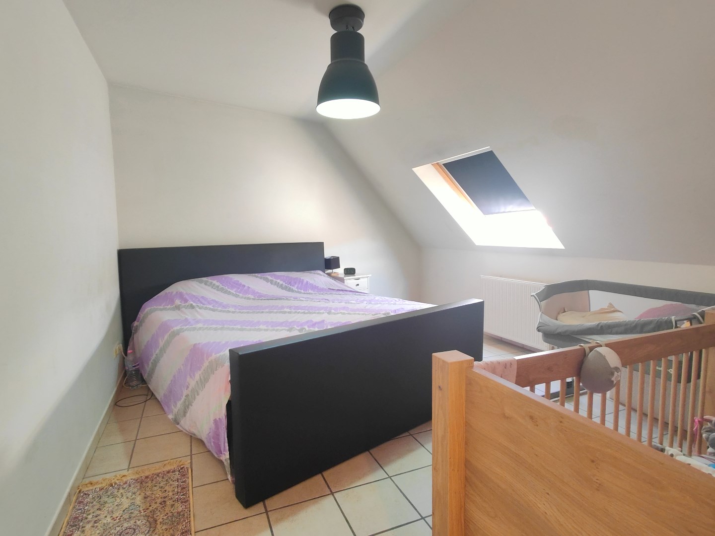 Ruime woning met achterliggende tuin en inpandige garage 