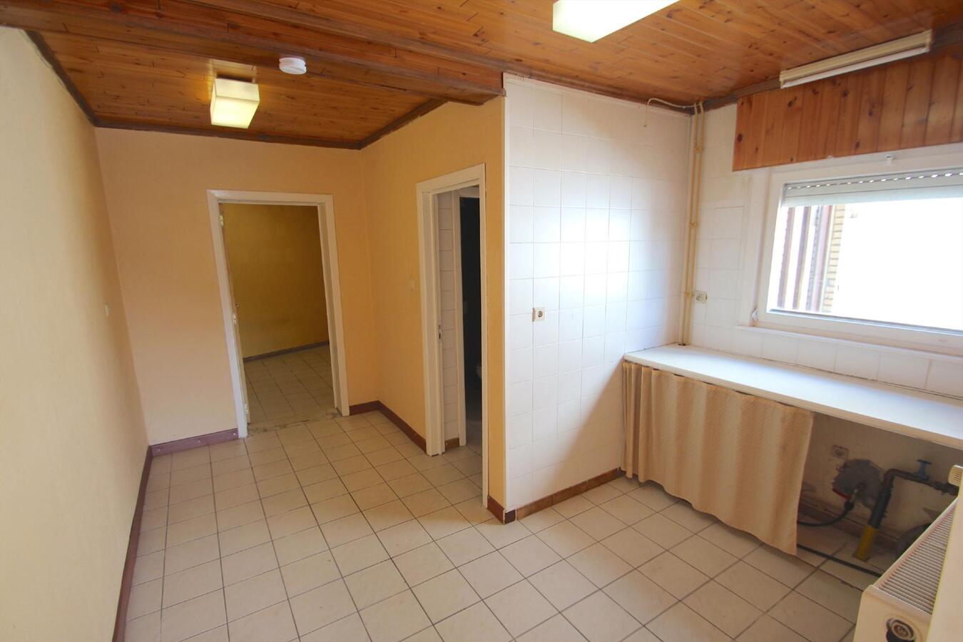 Woonhuis/ handelsruimte/ appartementen te koop ERTVELDE 