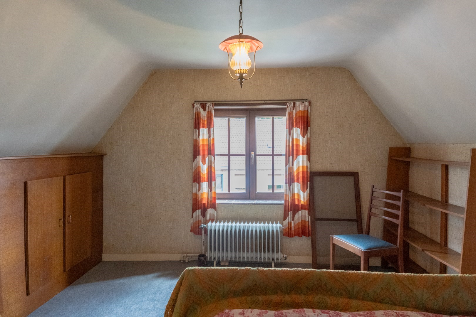 Te renoveren woning met grote tuin nabij Brugge 