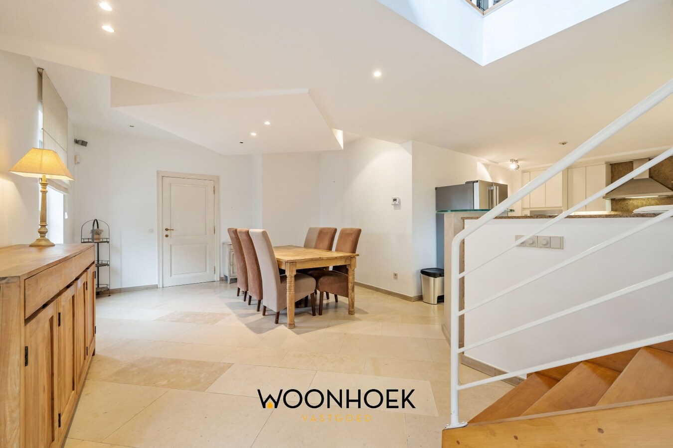 Centraal gelegen woning met handelsruimte te Lokeren 