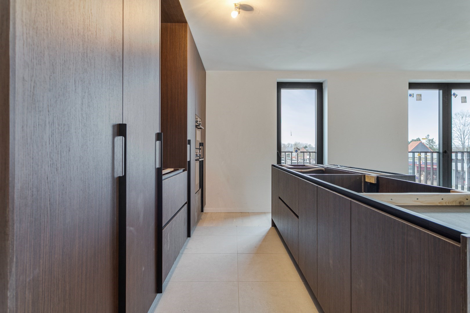 Nieuwbouwappartement met twee slaapkamers, terras en ondergrondse autostaanplaats te koop in Zulte 