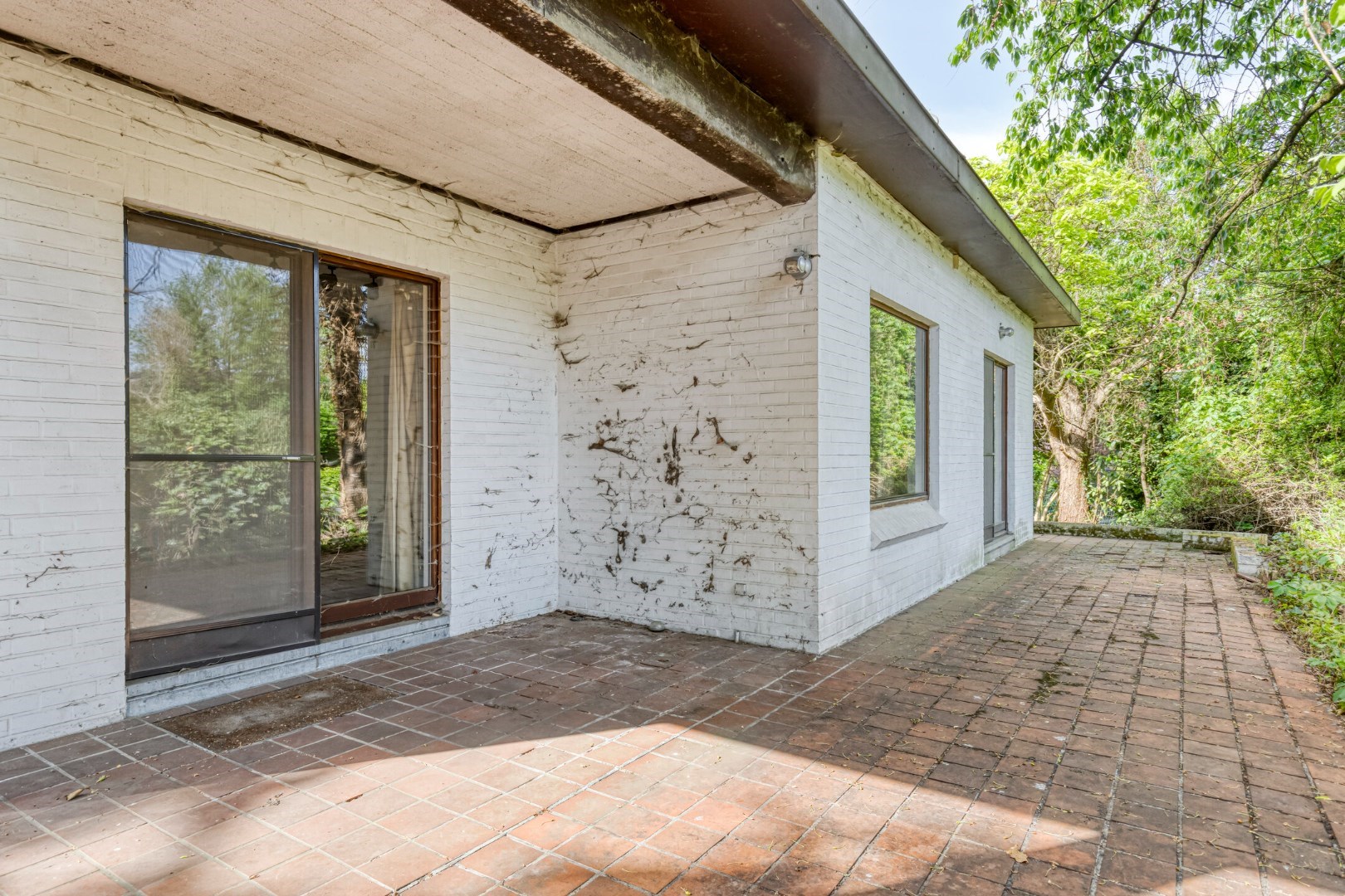 Ruime gezinswoning met 5 slaapkamers, praktijkruimte en dubbele garage in Kessel-Lo – EPC 337 kWh/m&#178; – bewoonbare oppervlakte ca. 301 m&#178; 