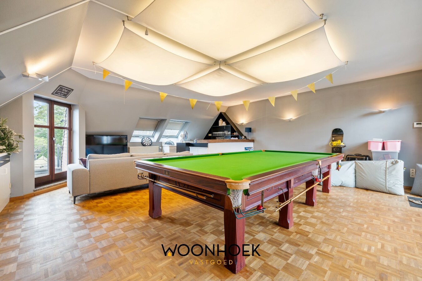 Centraal gelegen woning met handelsruimte te Lokeren 