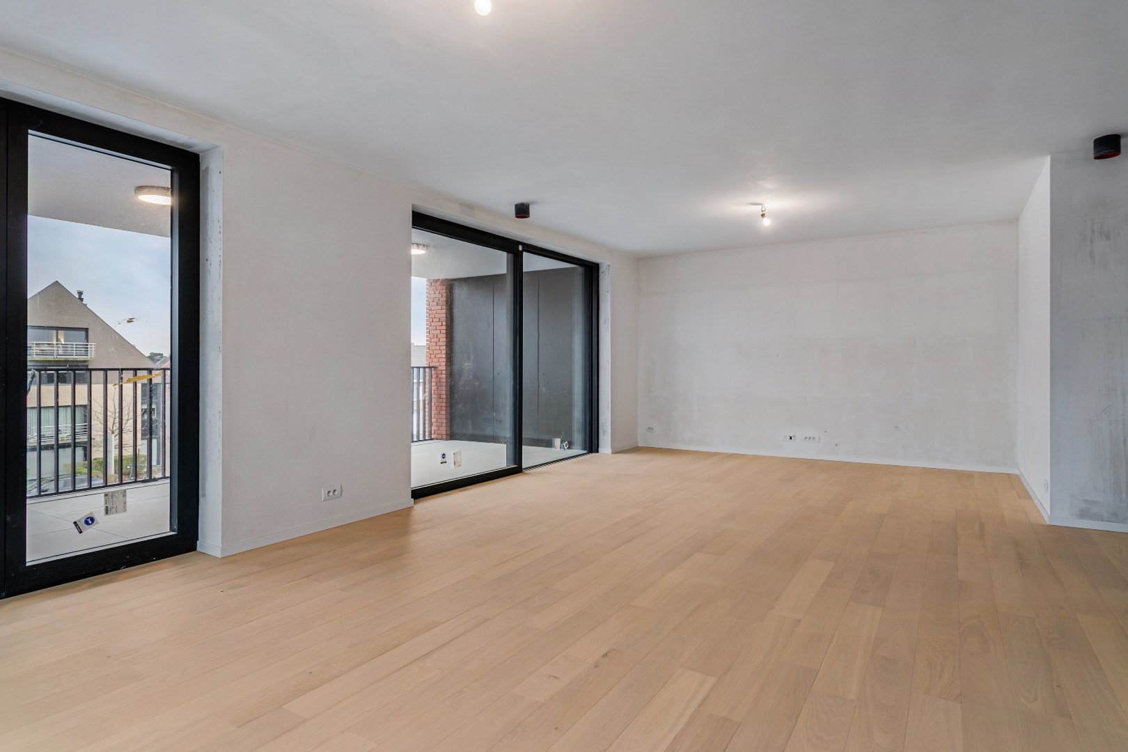 Nieuwbouwappartement met twee slaapkamers, terras en ondergrondse autostaanplaats te koop in Zulte 