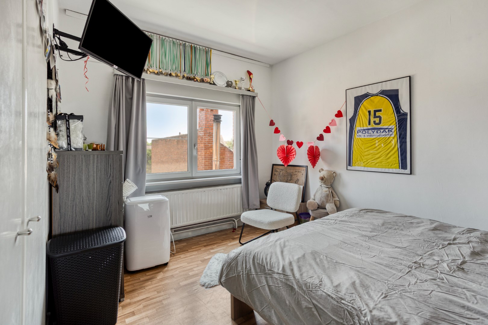 Instapklare gezinswoning met gezellige stadstuin in Geel-centrum 
