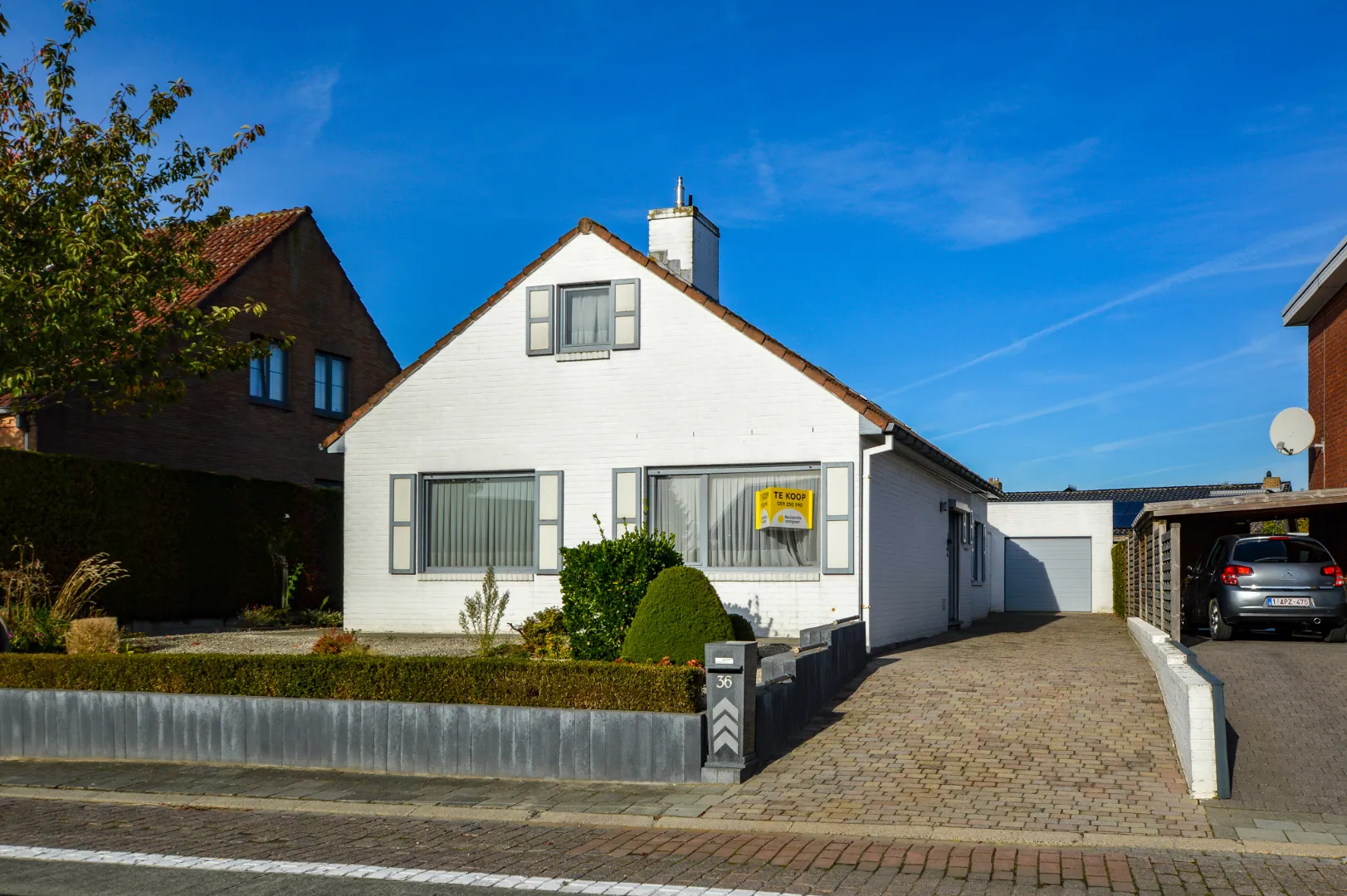 Op te frissen bungalow op 417 m² in centrum Aartrijke 