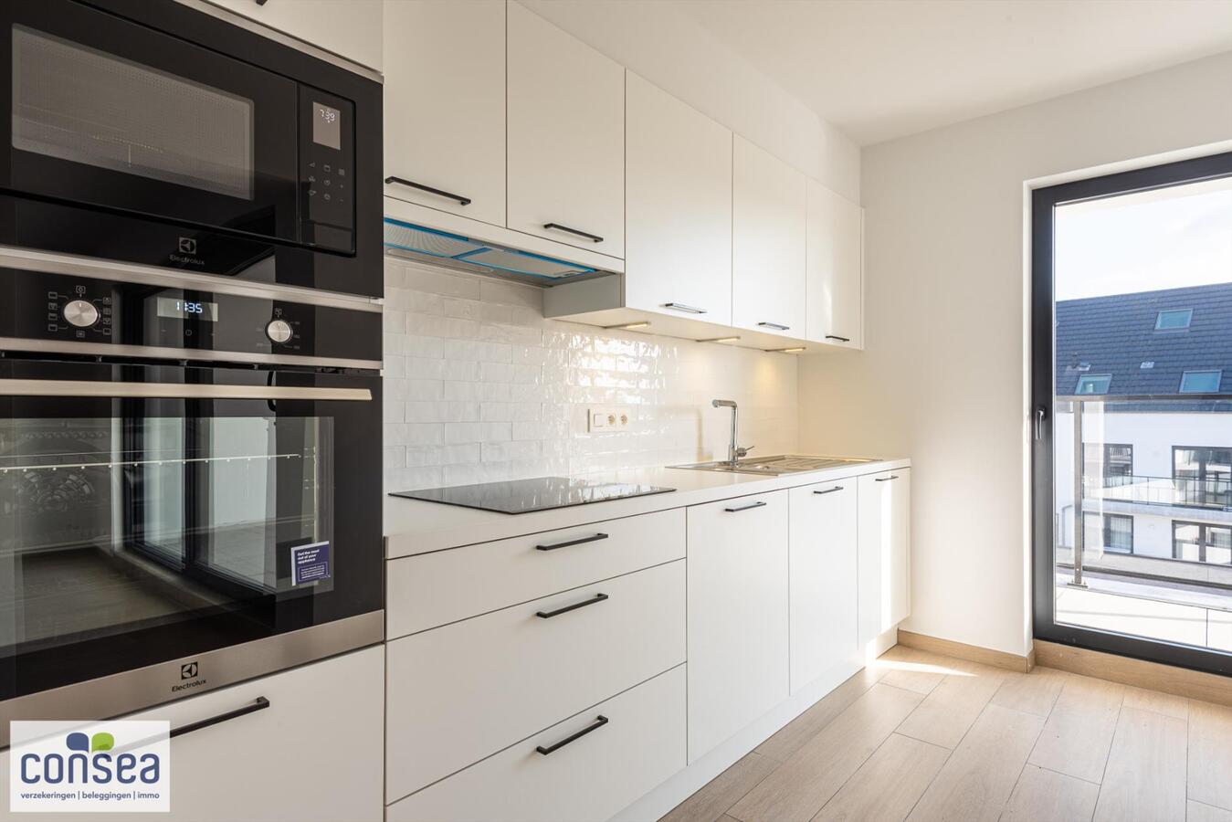 Lichtrijk appartement in het centrum van Maldegem met zicht op de kerk en overdekt terras van 15m&#178; 