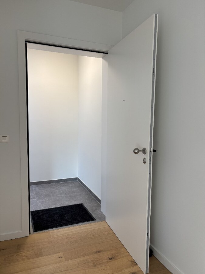 Stijlvol nieuwbouwappartement met zonneterras en garage in het hart van Sint-Antonius 