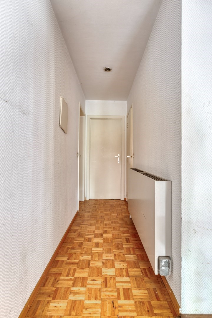 Ruime gezinswoning met 5 slaapkamers, praktijkruimte en dubbele garage in Kessel-Lo – EPC 337 kWh/m&#178; – bewoonbare oppervlakte ca. 301 m&#178; 