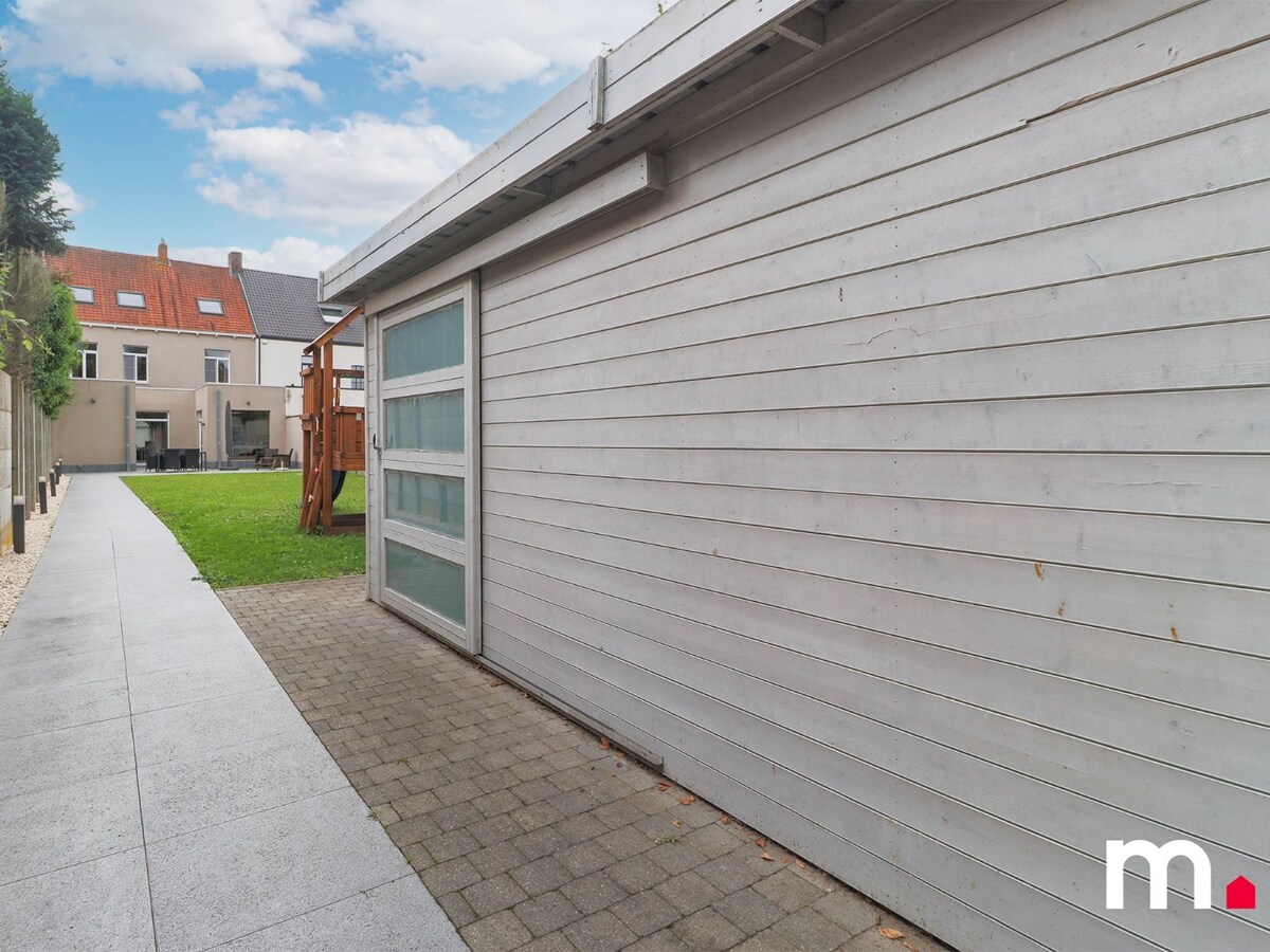 Prachtige herenwoning met 5 slaapkamers, tuin en uitweg! 