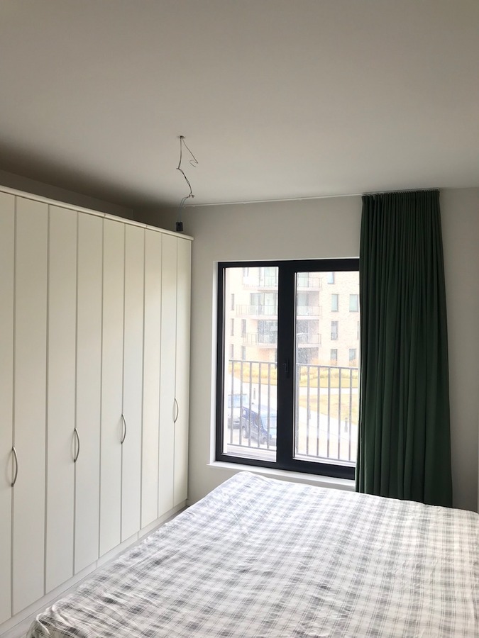Kwalitatief afgewerkt nieuwbouw appartement met twee slaapkamers centrum Gent 