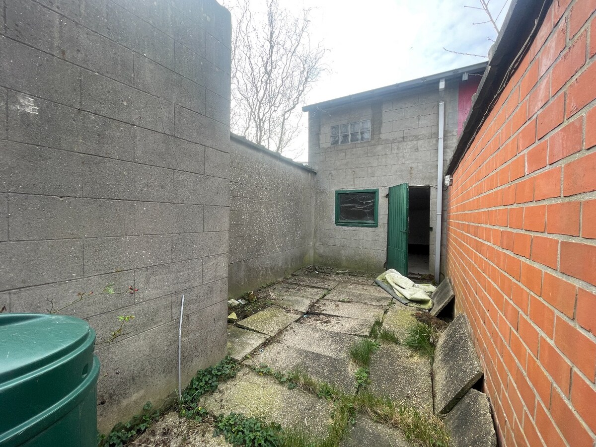 Centraal gelegen rijwoning met twee slaapkamers en tuin 