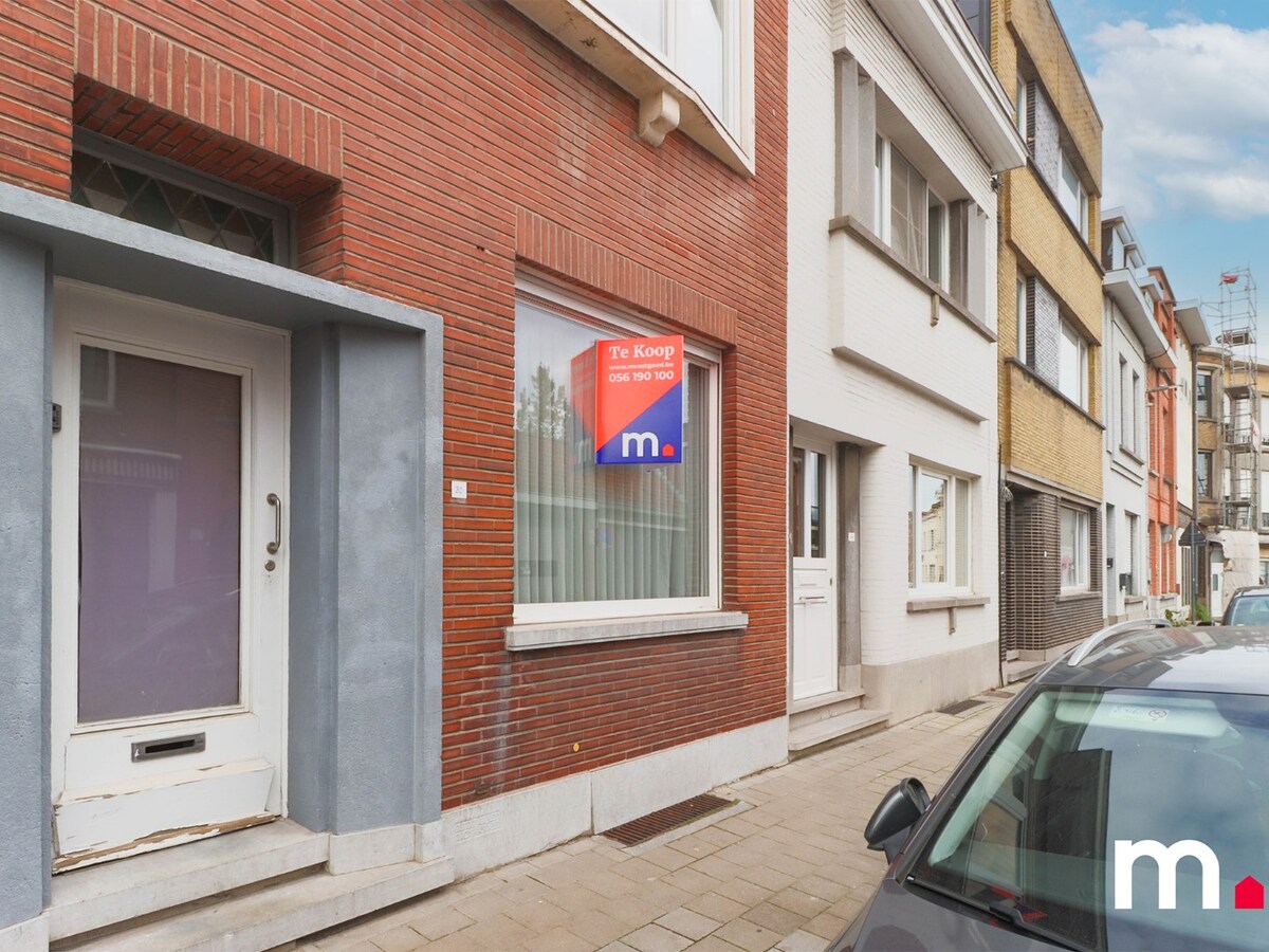 Goed gelegen karaktervolle woning  met uitweg nabij het centrum van Kortrijk ! 