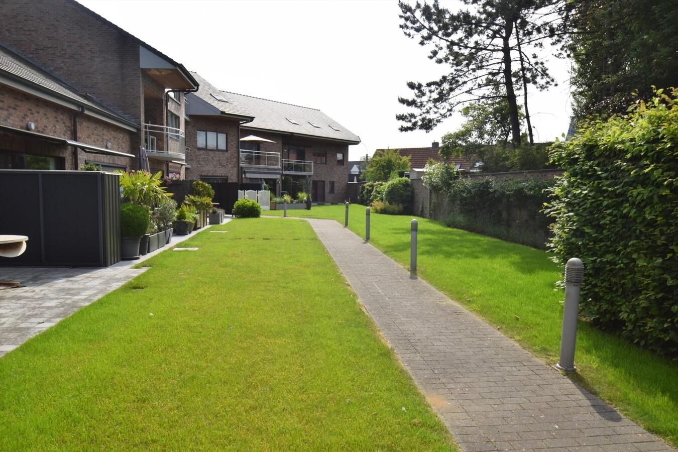 Ruim en comfortabel appartement op gelijkvloers met zonnig terras uitgevend op gemeenschappelijke tuin 