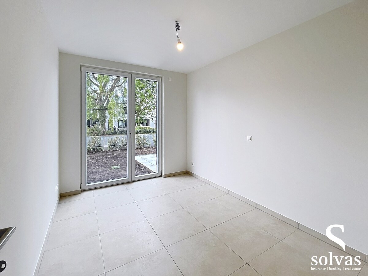 Ruim nieuwbouwappartement met tuin, terras, garage en 3 slaapkamers op prachtige locatie (Vaart) te Bellem 