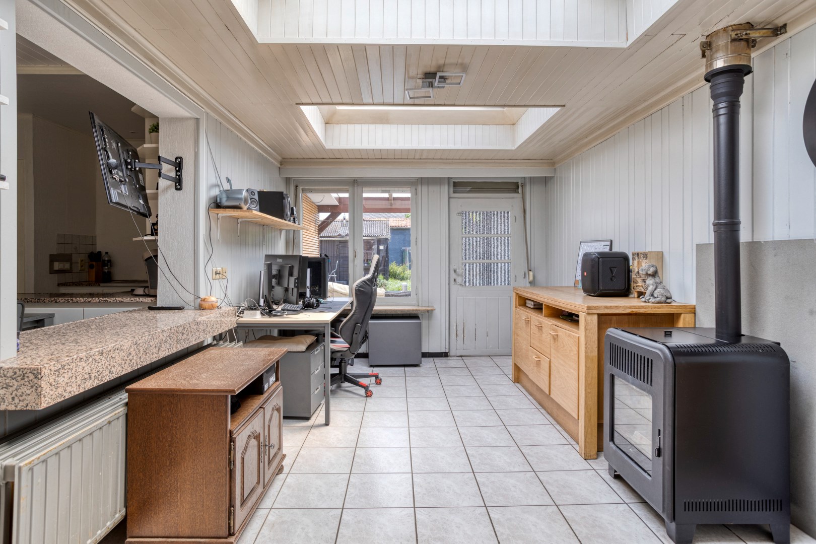 Instapklare gezinswoning met gezellige stadstuin in Geel-centrum 