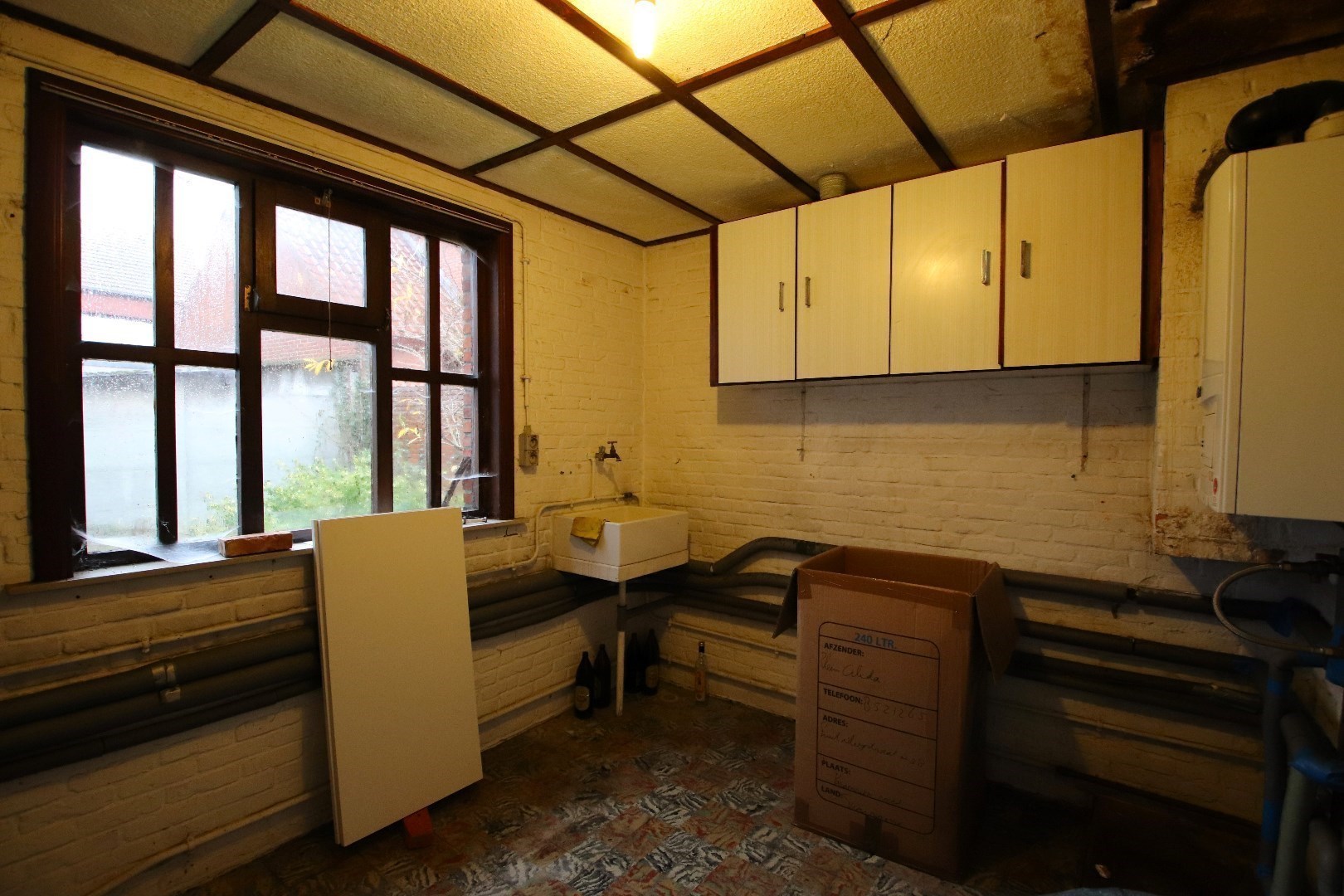Gezinswoning met 4 slpk. en garage zonder renovatieverplichting in centrum Mol 