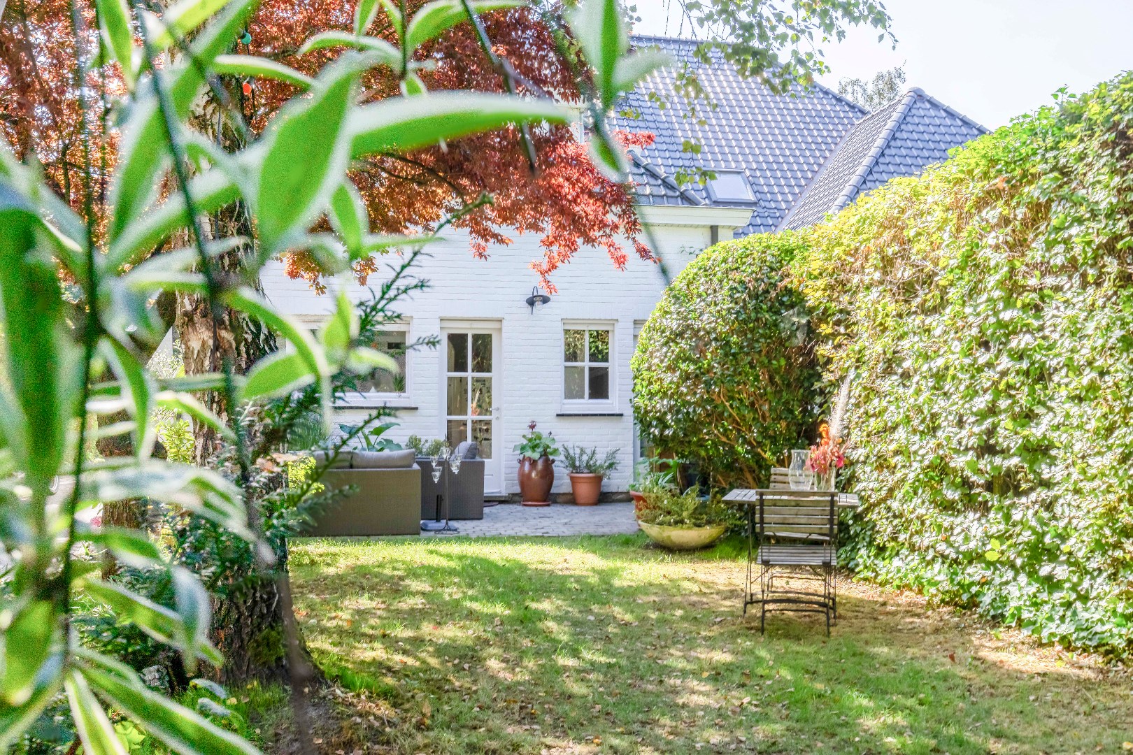 Woning met 4 slpkamers, leuke tuin en garage te Mariakerke 