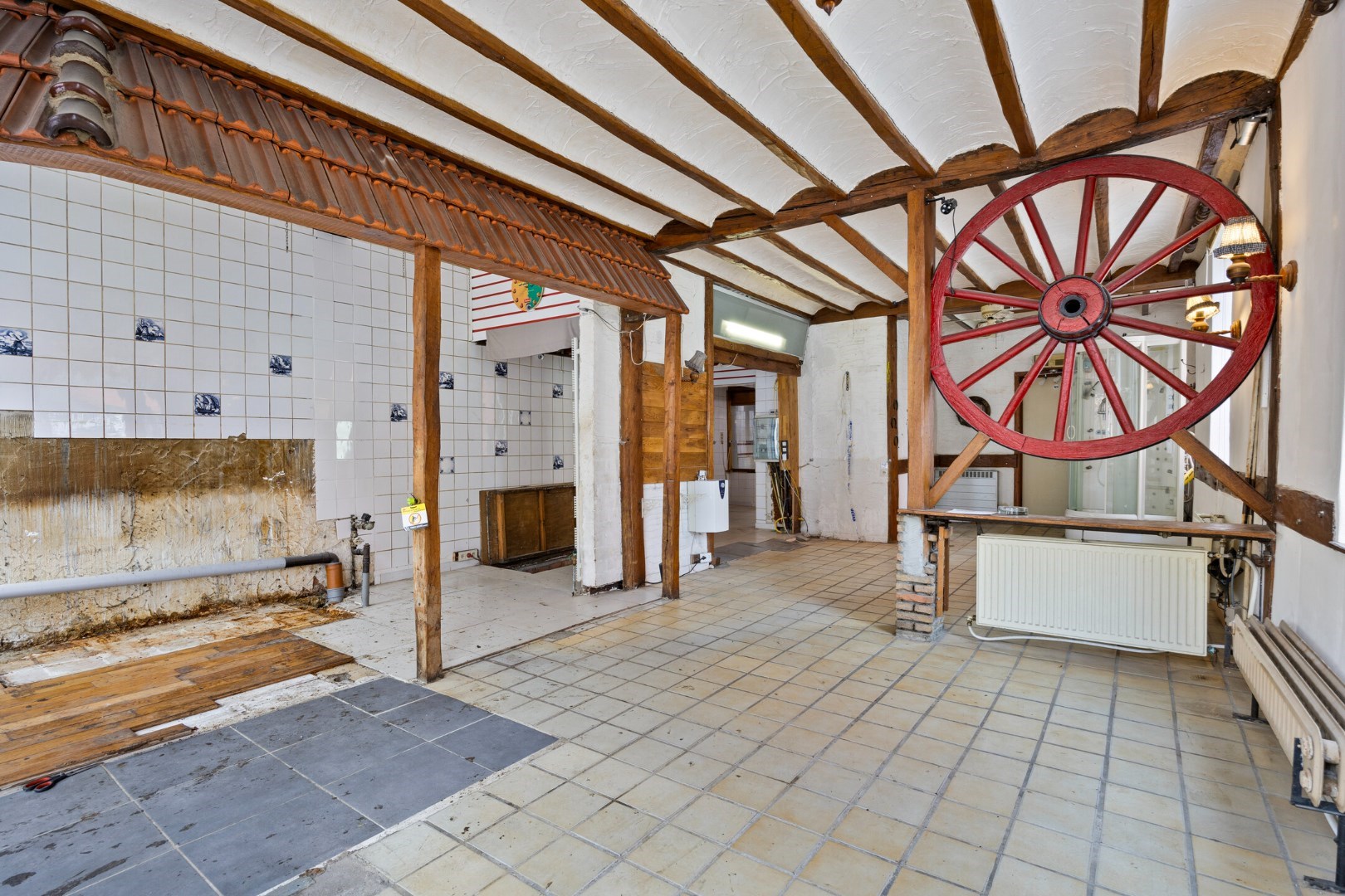 Halfopen hoekwoning met garage en dakterras op toplocatie in Kessel-Lo – renovatieproject met veel potentieel 