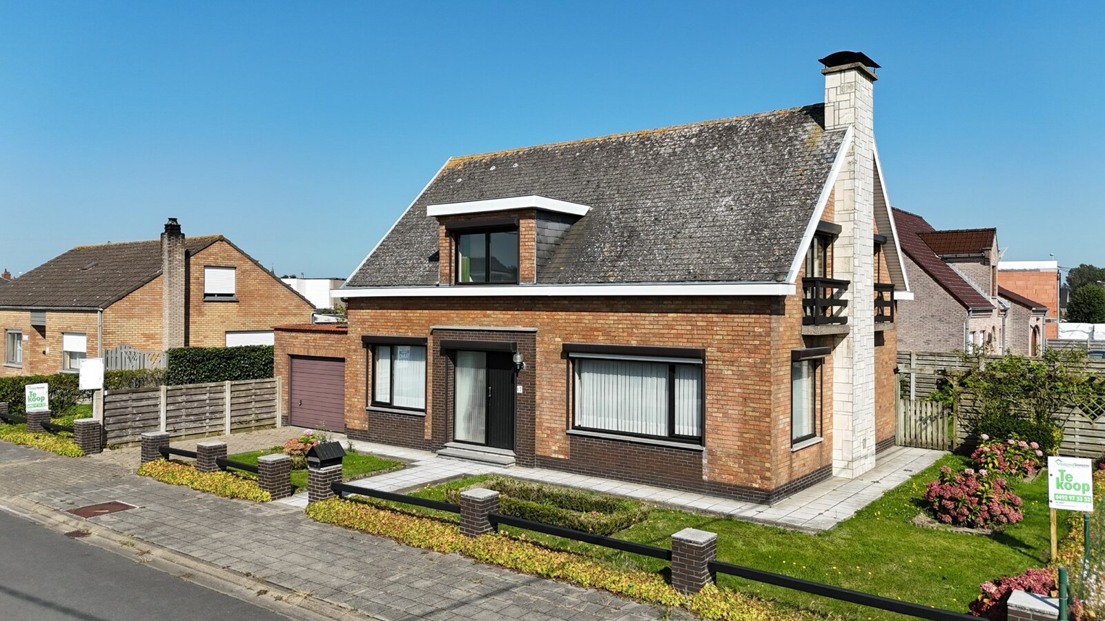 Alleenstaande woning met 4 slaapkamers en garage te Westende 