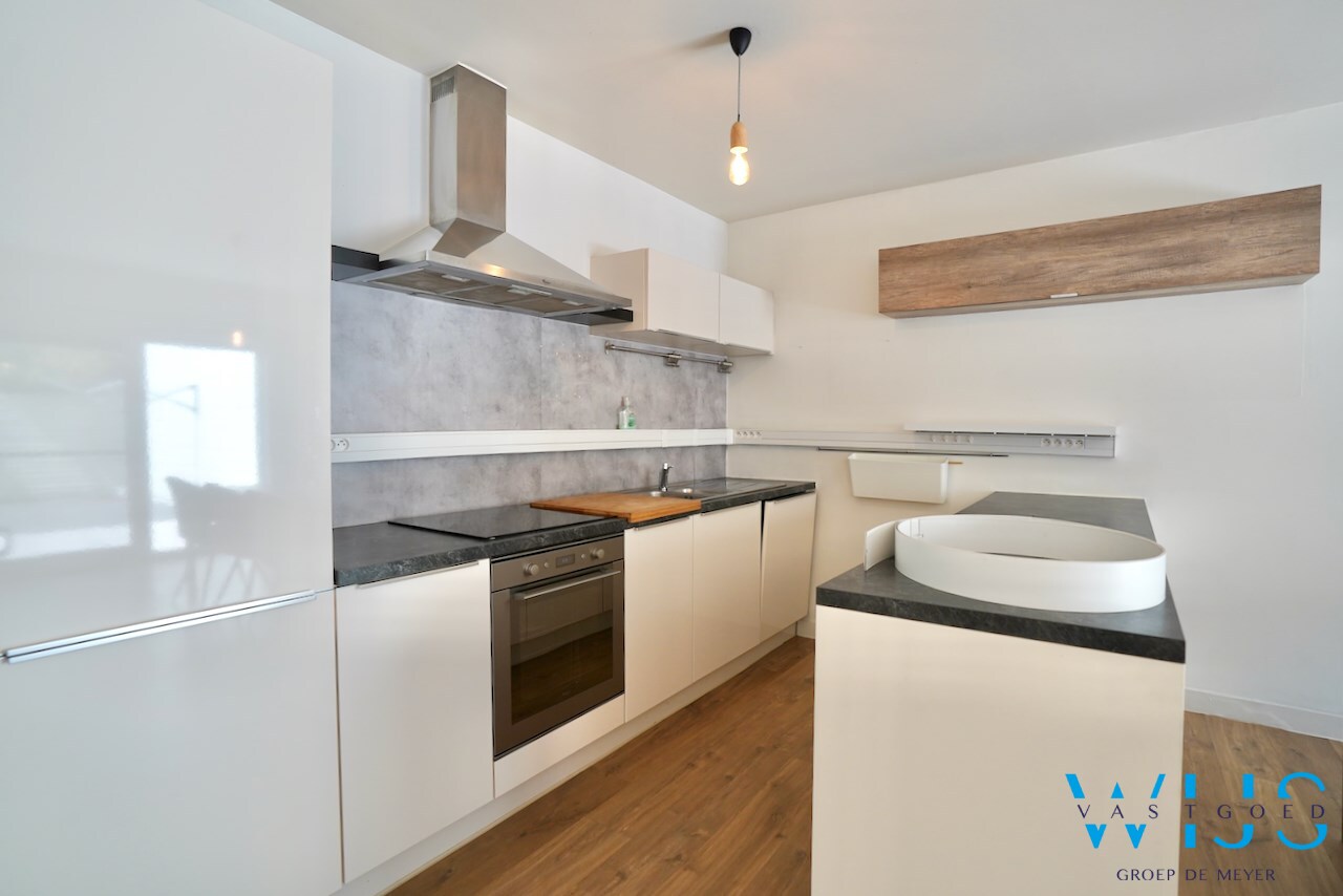 Prachtig 1 slaapkamer appartement op het gelijkvloers met toffe tuin ! 