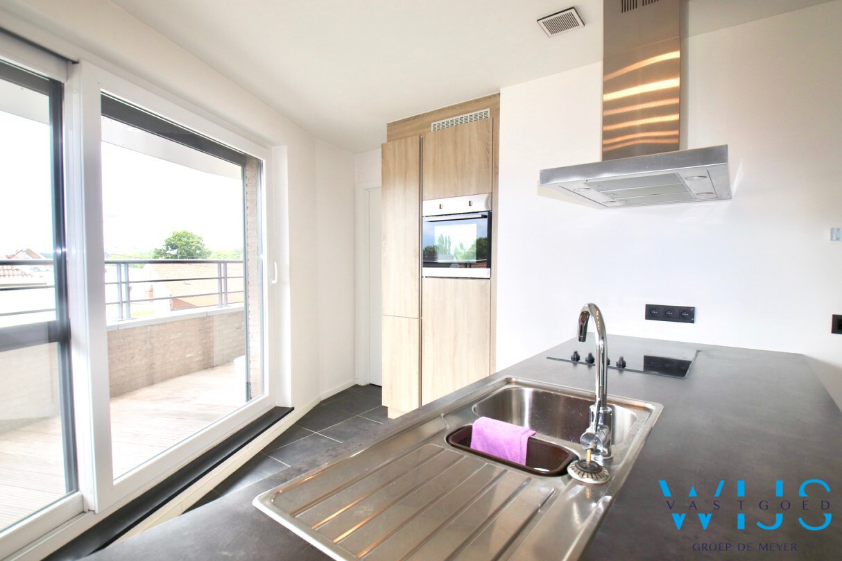 Instapklaar appartement met ruim zonneterras &amp; garage te Evergem ! 