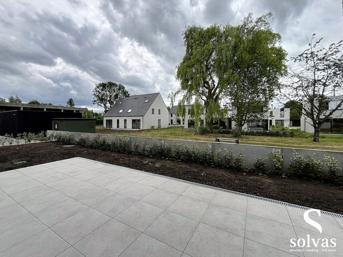 Ruim nieuwbouwappartement met tuin, terras, garage en 3 slaapkamers op prachtige locatie (Vaart) te Bellem 