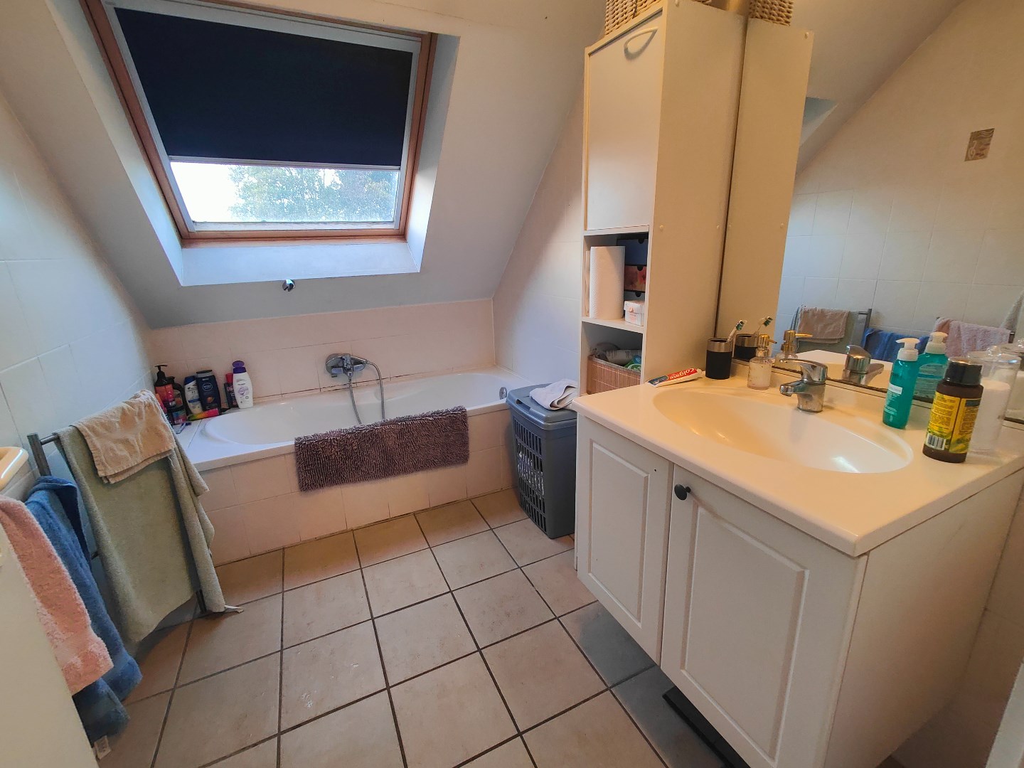 Ruime woning met achterliggende tuin en inpandige garage 