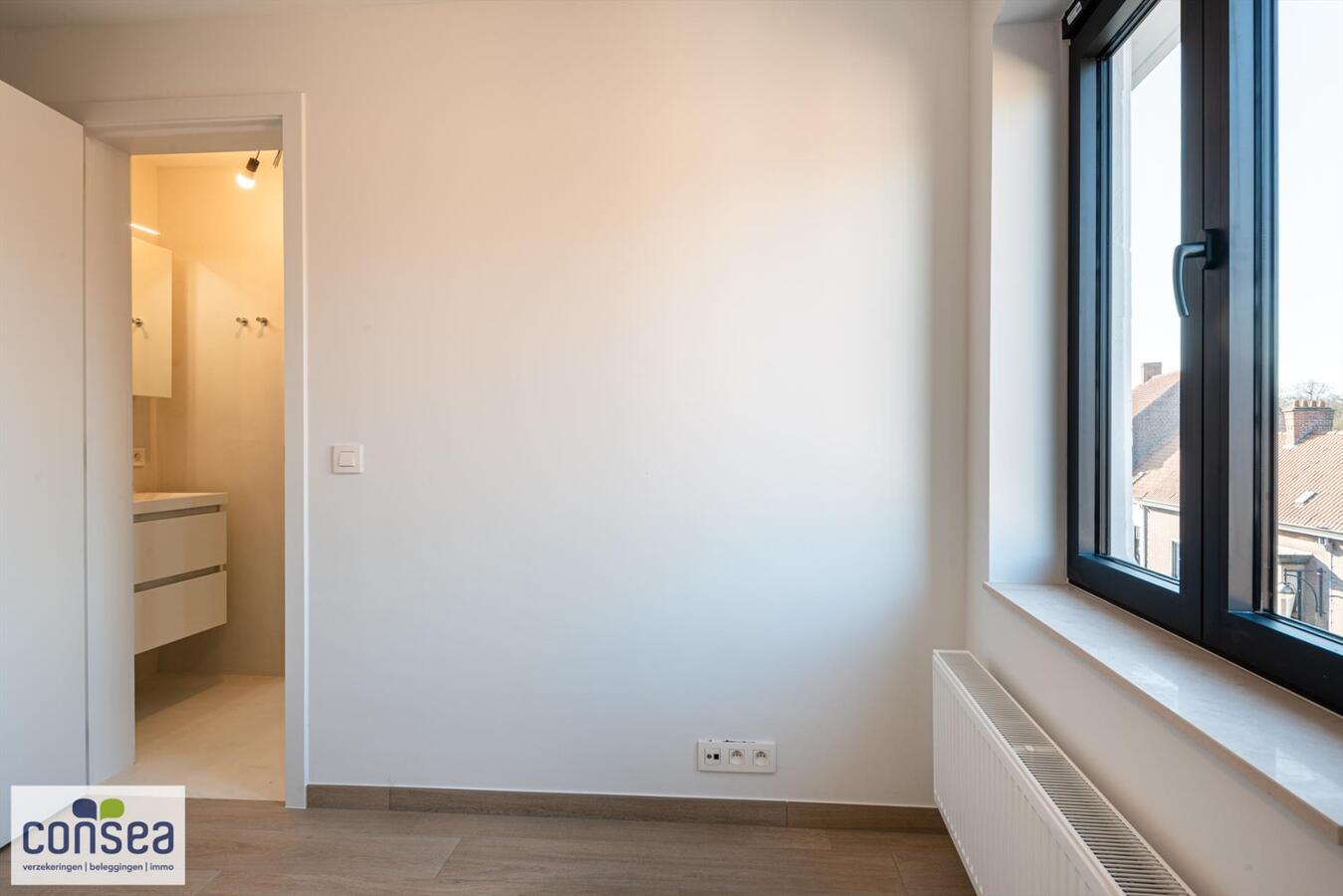 Lichtrijk appartement in het centrum van Maldegem met zicht op de kerk en overdekt terras van 15m&#178; 