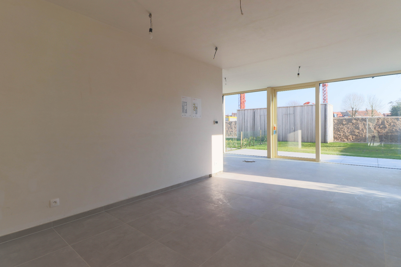 Moderne nieuwbouwwoningen met garage in groene omgeving te Kuurne 