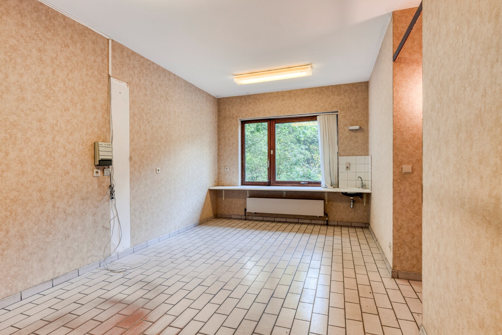 Ruime gezinswoning met 5 slaapkamers, praktijkruimte en dubbele garage in Kessel-Lo – EPC 337 kWh/m&#178; – bewoonbare oppervlakte ca. 301 m&#178; 