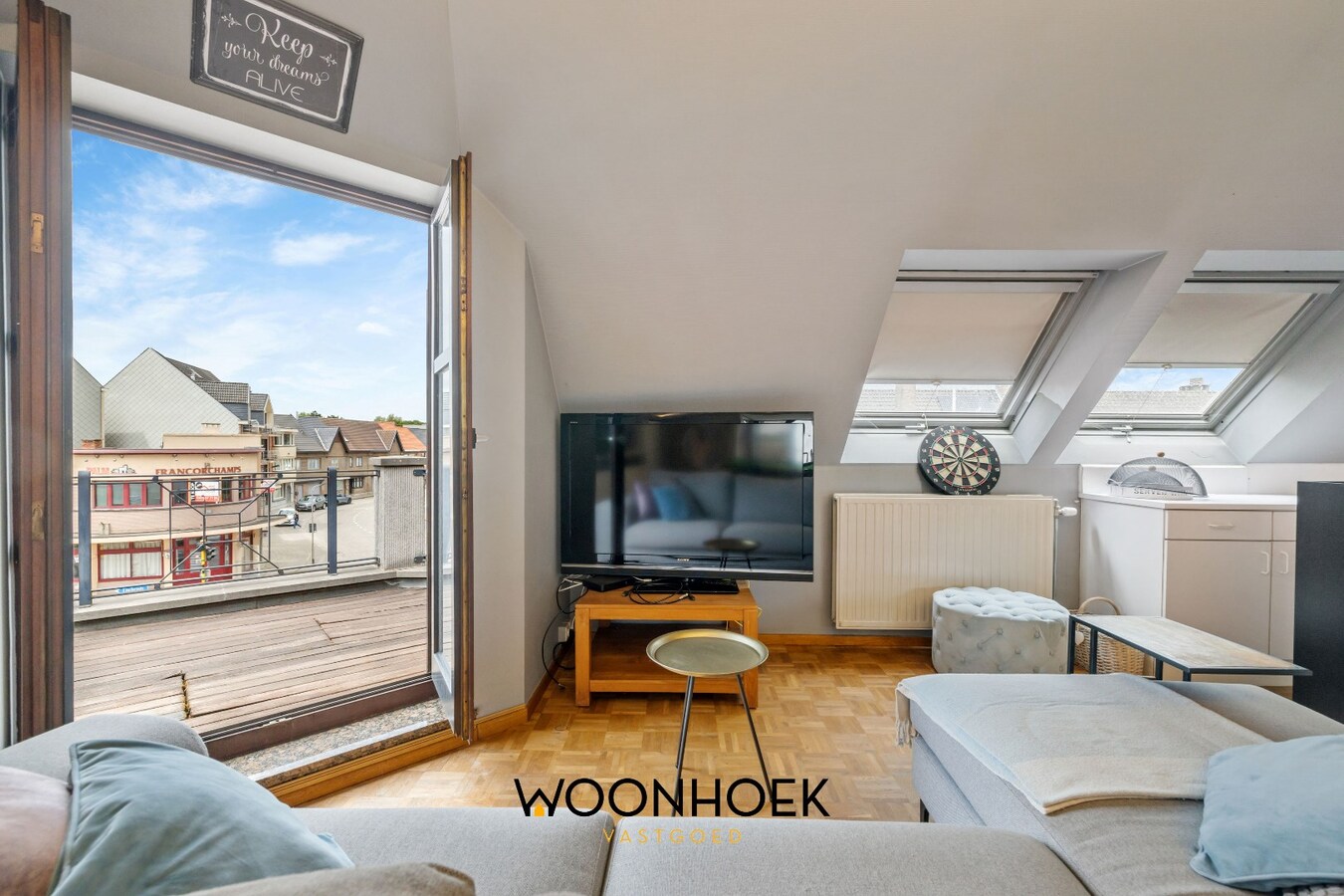 Centraal gelegen woning met handelsruimte te Lokeren 
