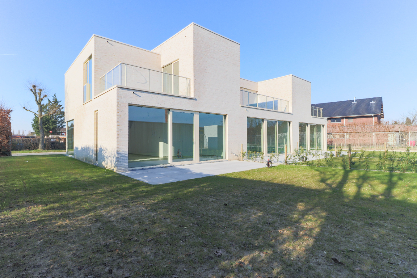 Moderne nieuwbouwwoningen met garage in groene omgeving te Kuurne 