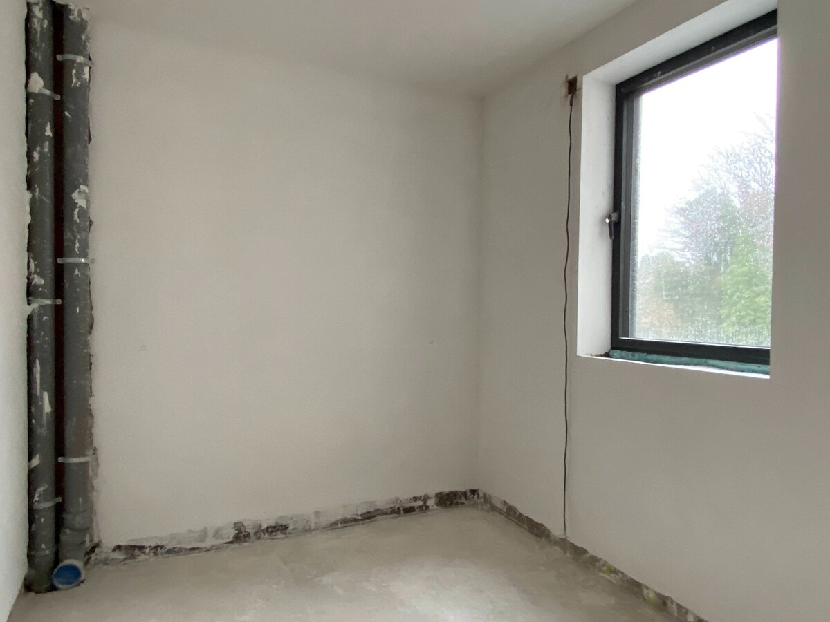 Luxueus nieuwbouw villa-appartement  van 168 m&#178; met 3 slaapkamers + ondergrondse garage en kelder in kleine residentie 