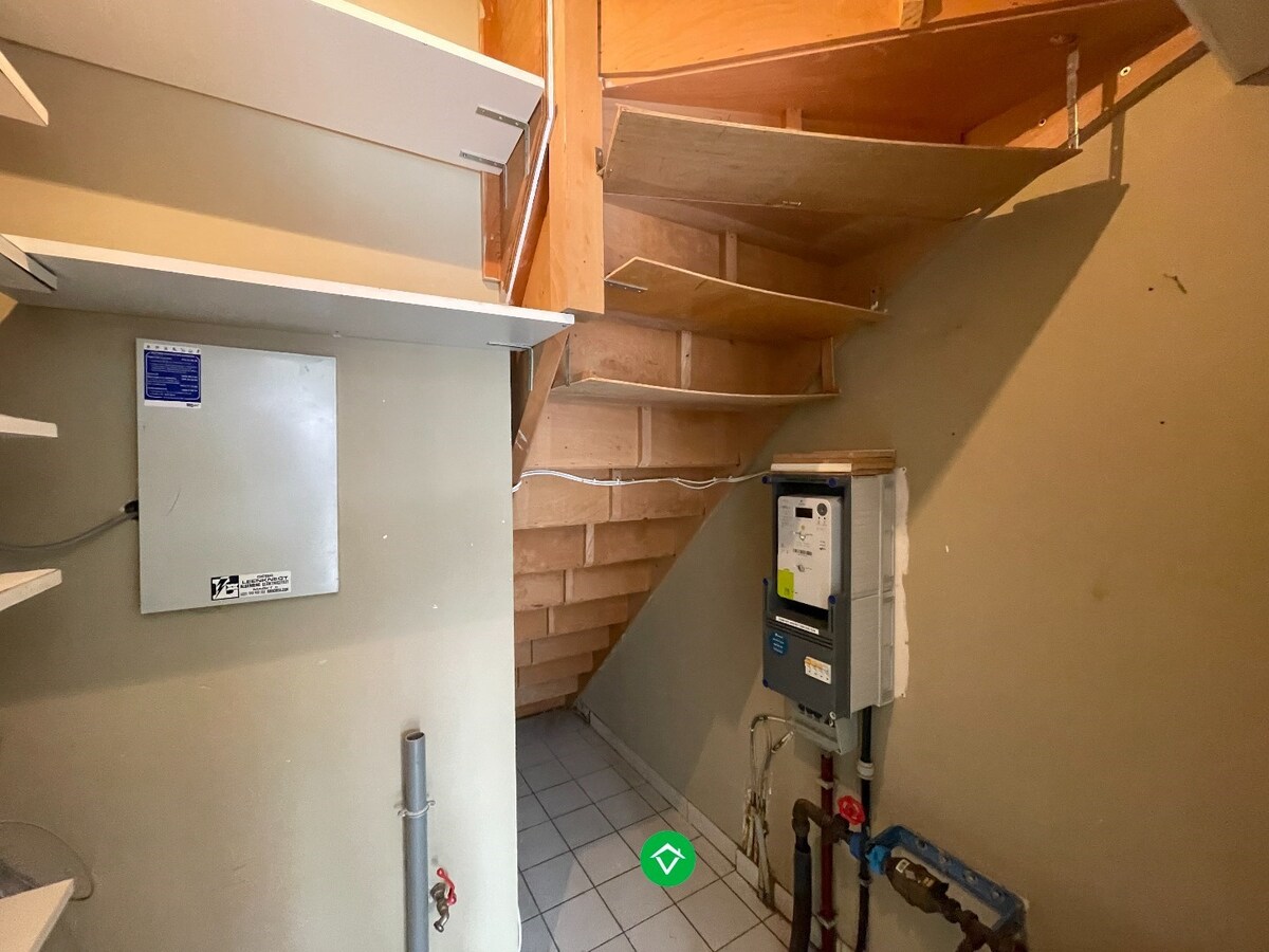 Gezellige rijwoning met 3 slaapkamers, terrastuin en garage te Kachtem 