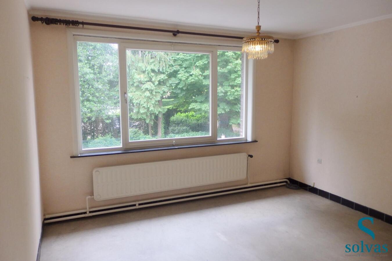 Topper! Ruime burgerwoning met rustieke tuin en groot magazijn 