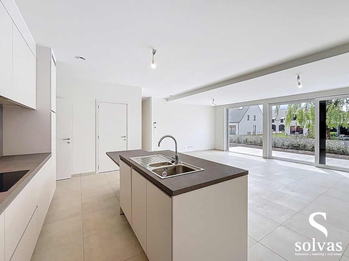 Ruim nieuwbouwappartement met tuin, terras, garage en 3 slaapkamers op prachtige locatie (Vaart) te Bellem 