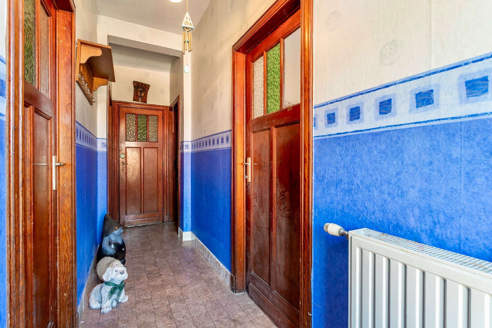 Te renoveren woning met omliggende gronden 