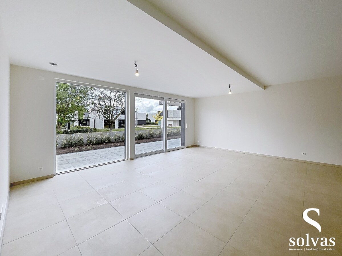 Ruim nieuwbouwappartement met tuin, terras, garage en 3 slaapkamers op prachtige locatie (Vaart) te Bellem 