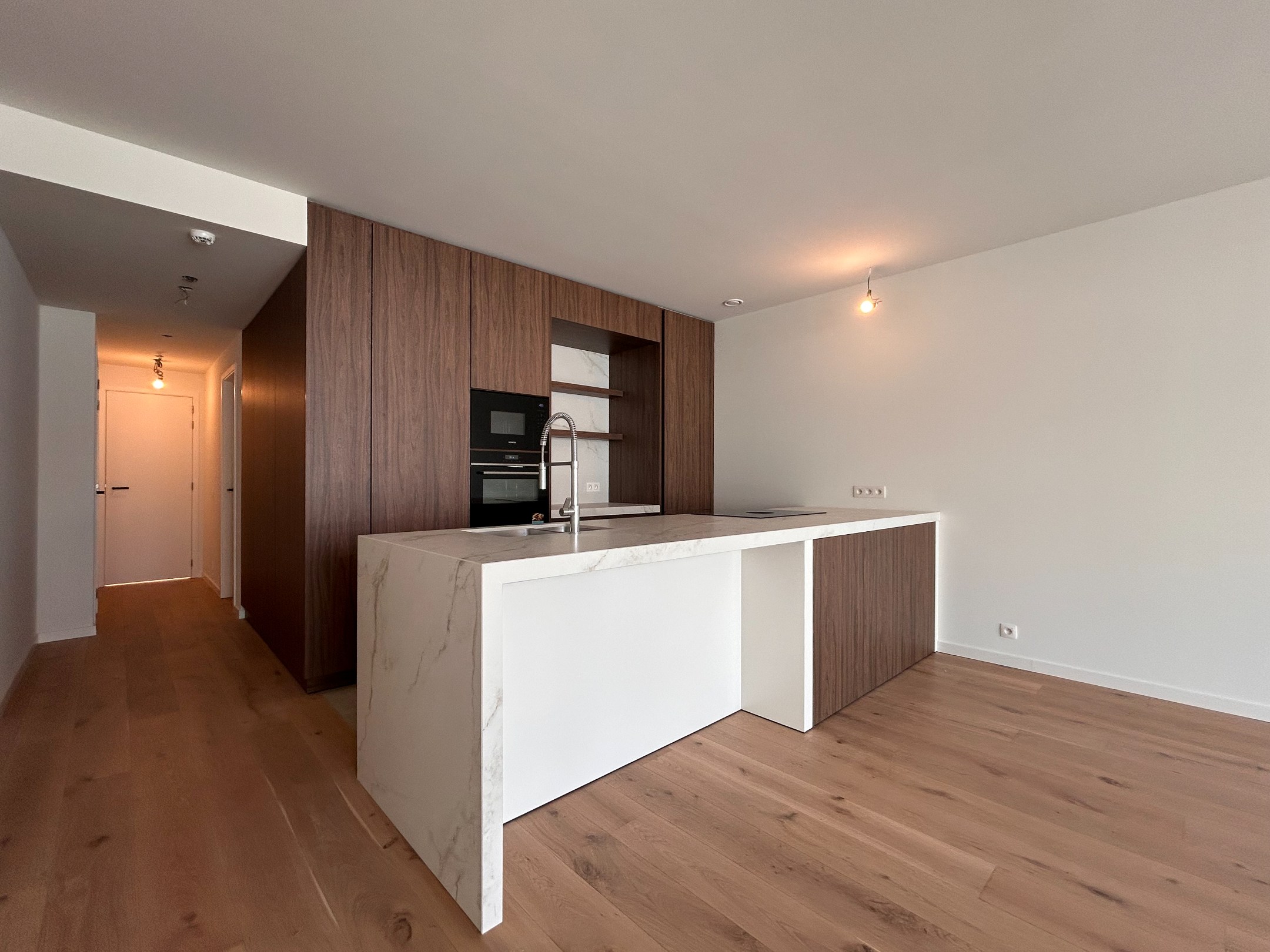 NIEUWBOUWPROJECT FLEUR: Ongemeubeld - modern nieuwbouwappartement met twee slaapkamers in het centrum te Knokke 