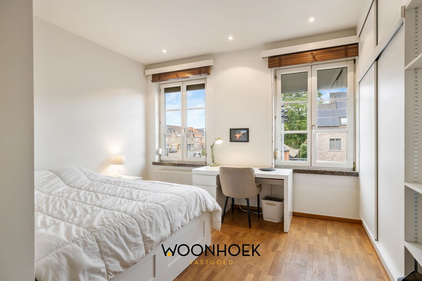 Centraal gelegen woning met handelsruimte te Lokeren 