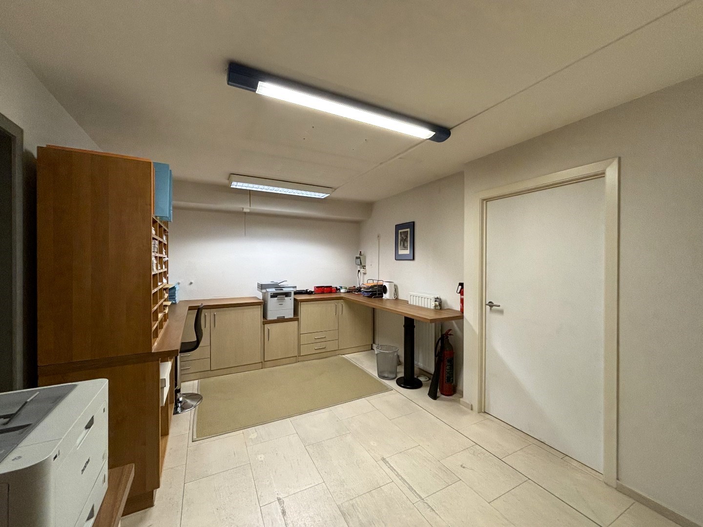 Energiezuinig 1 slpk. appt. met onderliggend praktijk- of kantoorruimte in centrum Lommel 