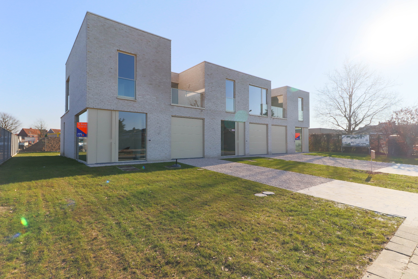 Moderne nieuwbouwwoningen met garage in groene omgeving te Kuurne 