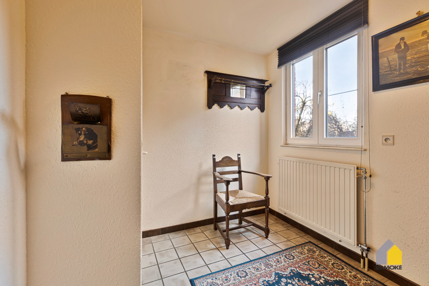 Gelijkvloers appartement (89 m&#178;) met 2 slaapkamers, stadstuintje en kelderberging. 