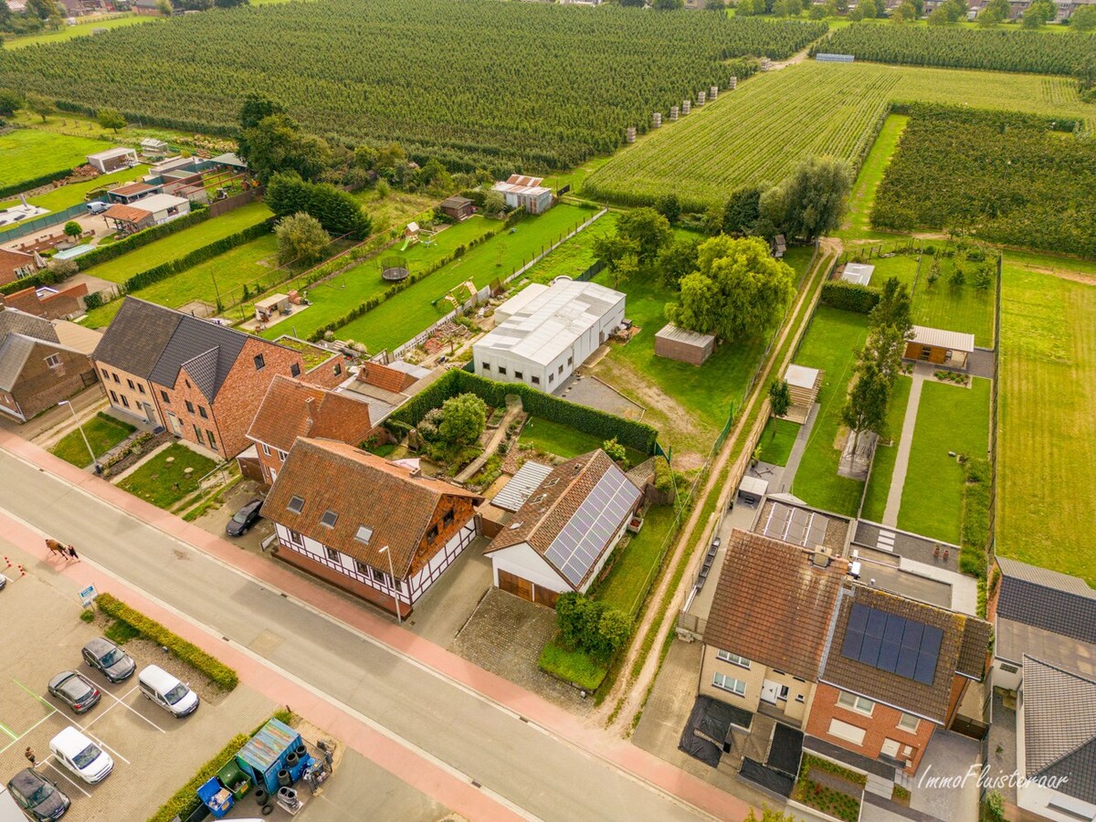 Ruime woning met bijgebouw en een loods op ca. 25 are te Kortessem 