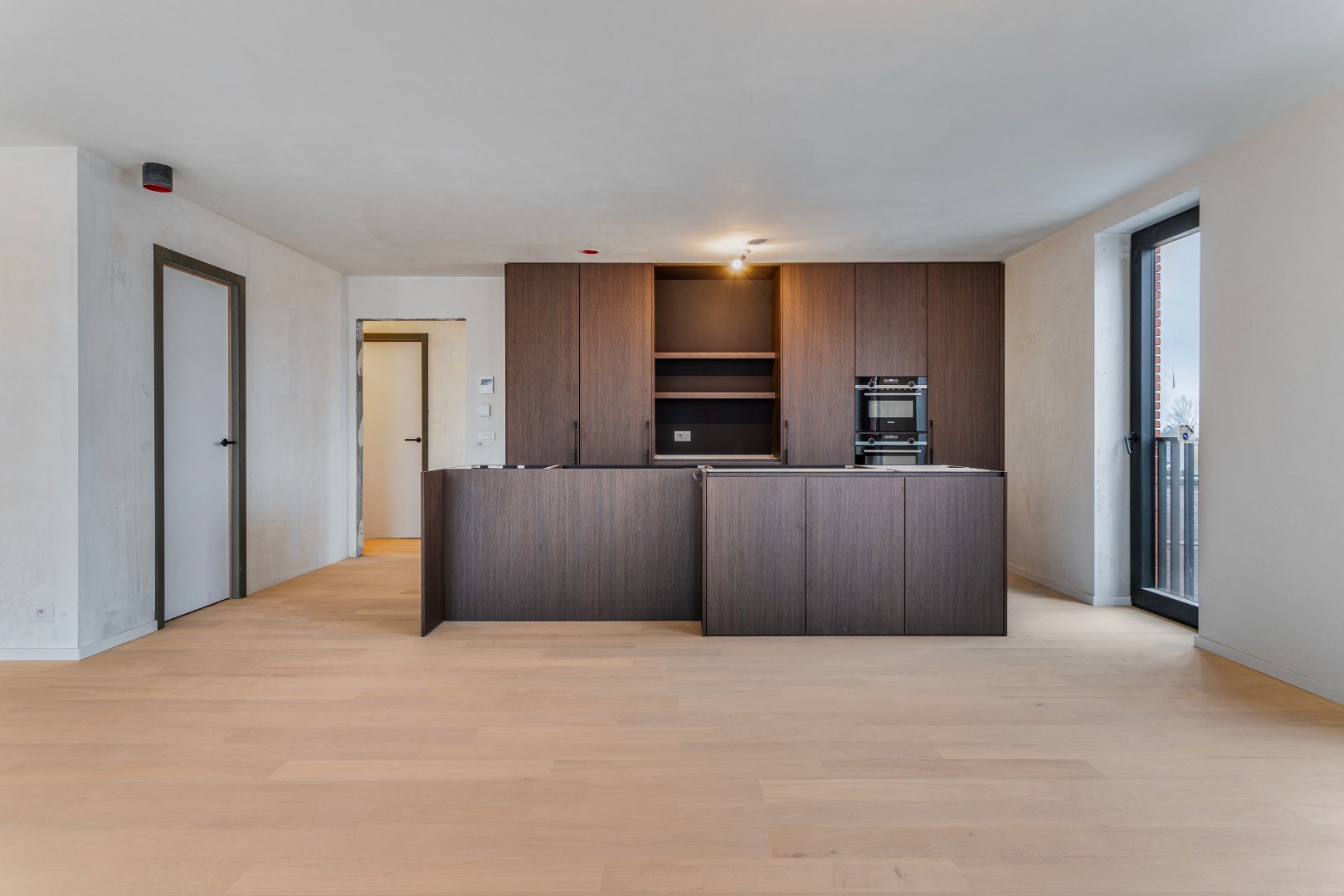 Nieuwbouwappartement met twee slaapkamers, terras en ondergrondse autostaanplaats te koop in Zulte 
