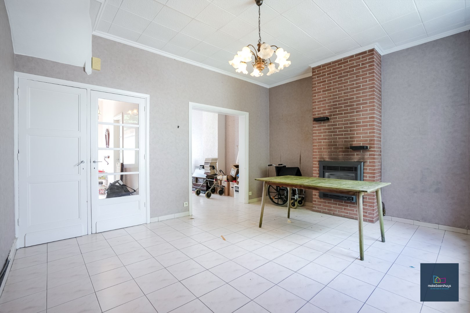 Centraal gelegen te renoveren woning in rij met tuin te Mariakerke 