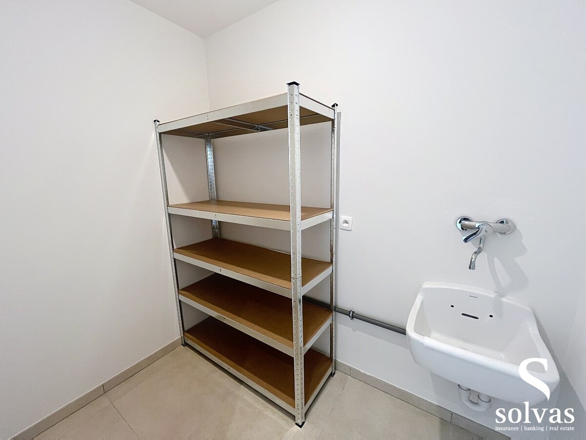 Ruim nieuwbouwappartement met tuin, terras, garage en 3 slaapkamers op prachtige locatie (Vaart) te Bellem 