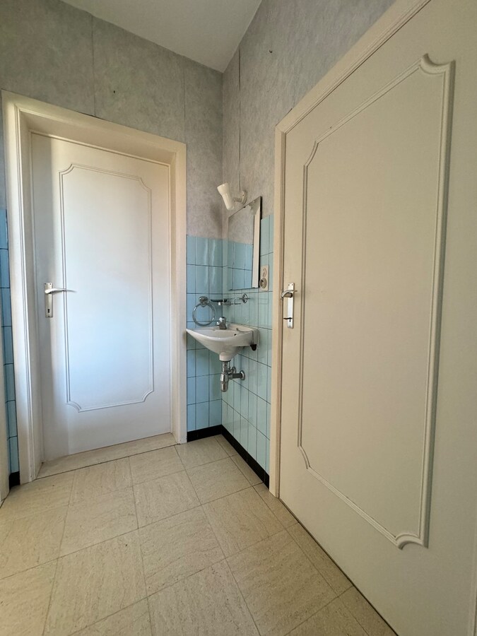Alleenstaande woning met 4 slaapkamers en garage te Westende 